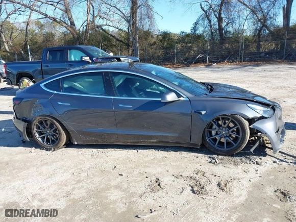 2019 Tesla Model 3 Long Range with VIN 5YJ3E1EB2KF385998, listed as a IAAI auction lot 41256676 with NaN miles. Bid and sale history available at carsss.com. Image 13.