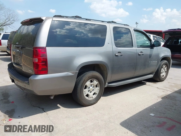 2007 Chevrolet Suburban LT with VIN 1GNFC16017R254537, listed as a IAAI auction lot 41875462 with 150,579 mi miles and . Bid and sale history available at DreamBid. Image 4.