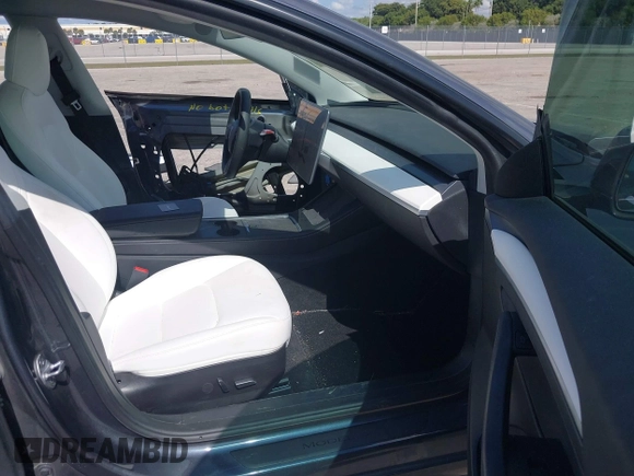 2022 Tesla Model 3 Performance with VIN 5YJ3E1EC9NF201184, listed as a IAAI auction lot 41534959 with 29,389 mi miles and . Bid and sale history available at DreamBid. Image 5.