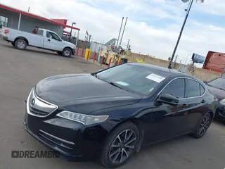 2015 Acura TLX V6 Tech with VIN 19UUB2F51FA001009, listed as a IAAI auction lot 41477548 with 131,776 mi miles. Bid and sale history available at carsss.com. Image 14.