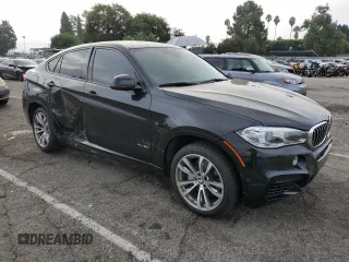2016 BMW X6 xDrive50i with VIN 5UXKU6C50G0R34210, listed as a Copart auction lot 69003723 with 33,134 mi miles. Bid and sale history available at carsss.com. Image 4.