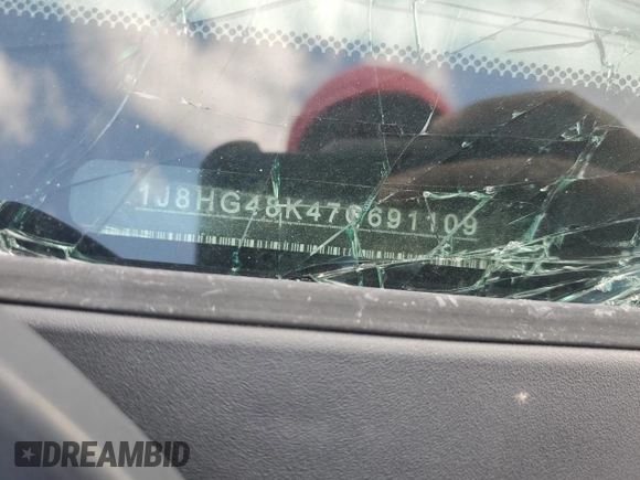 2007 Jeep Commander Sport z VIN 1J8HG48K47C691109, wystawiony jako Copart lot #52138775 z przebiegiem 231 327 mil mil oraz Szkoda całkowita • Salvage title. Historia ofert i sprzedaży dostępna na DreamBid. Obrazek 12.