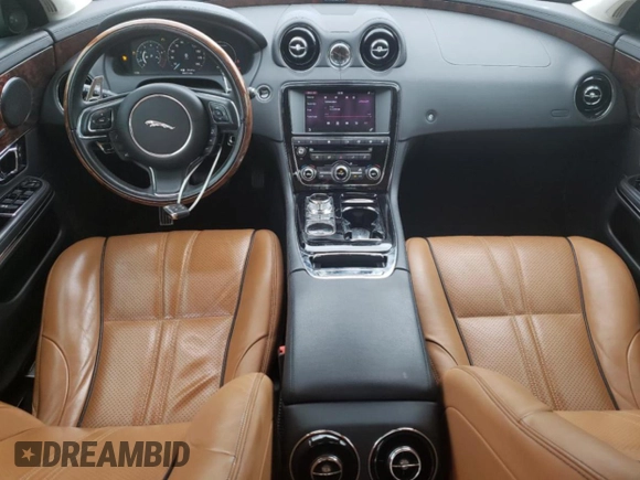 2017 Jaguar XJ with VIN SAJWA1C73H8W10544, listed as a Copart auction lot 70025724 with 64,437 mi miles and Salvage Title. Bid and sale history available at carsss.com. Image 8.