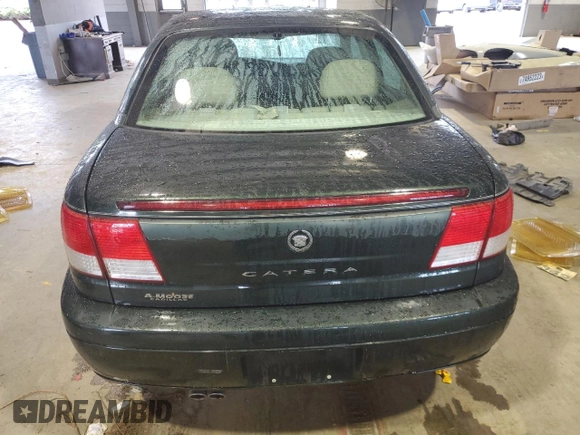 2000 Cadillac Catera z VIN W06VR54R7YR124650, wystawiony jako Copart lot #49602314 z przebiegiem 77 800 mil mil oraz Nie do naprawy • Non repairable. Historia ofert i sprzedaży dostępna na DreamBid. Obrazek 6.