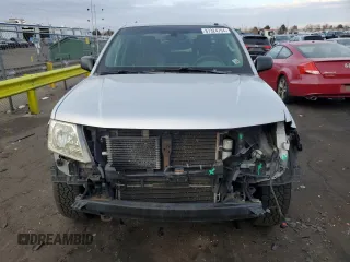 2010 Nissan Frontier SE with VIN 1N6AD0FVXAC420020, listed as a Copart auction lot 87324794 with 145,566 mi miles and Salvage title. Bid and sale history available at DreamBid. Image 5.