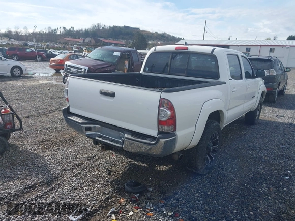 2015 Toyota Tacoma with VIN 3TMLU4EN5FM188601, listed as a IAAI auction lot 41883555 with 143,904 mi miles and . Bid and sale history available at DreamBid. Image 4.