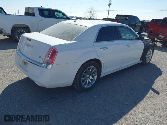 2014 Chrysler 300 with VIN 2C3CCAEG4EH312930, listed as a IAAI auction lot 41907509 with 128,940 mi miles. Bid and sale history available at carsss.com. Image 4.
