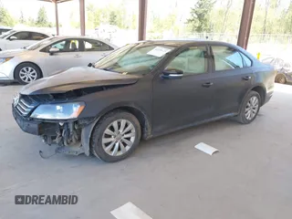 2015 Volkswagen Passat 1.8T Limited Edition with VIN 1VWAT7A36FC054484, listed as a IAAI auction lot 42078125 with 119,550 mi miles. Bid and sale history available at carsss.com. Image 18.