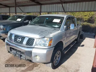 2004 Nissan Titan LE z VIN 1N6AA07BX4N537229, wystawiony jako IAAI lot #41234790 z przebiegiem 210 475 mil mil oraz . Historia ofert i sprzedaży dostępna na DreamBid. Obrazek 2.