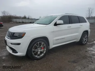 2015 Jeep Grand Cherokee SRT with VIN 1C4RJFDJ6FC941941, listed as a Copart auction lot 50613315 with 173,992 mi miles and Salvage Title. Bid and sale history available at carsss.com. Image 1.
