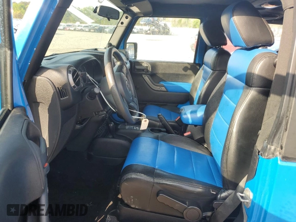 2012 Jeep Wrangler Sport with VIN 1C4AJWAG3CL144015, listed as a Copart auction lot 50969705 with 93,417 mi miles and Salvage title. Bid and sale history available at DreamBid. Image 7.