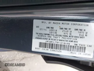 2015 Mazda 3 i Touring with VIN JM1BM1L79F1218498, listed as a IAAI auction lot 41876820 with 87,602 mi miles and . Bid and sale history available at carsss.com. Image 9.