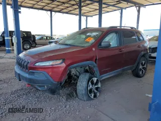 2014 Jeep Cherokee Trailhawk z VIN 1C4PJMBS3EW273505, wystawiony jako Copart lot #53921475 z przebiegiem 164 231 mil mil oraz Szkody całkowita. Historia ofert i sprzedaży dostępna na DreamBid. Obrazek 1.