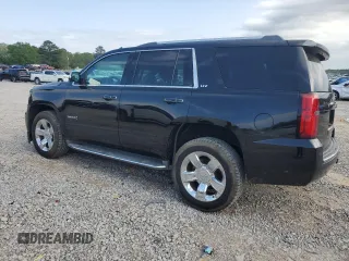 2016 Chevrolet Tahoe LTZ с VIN 1GNSCCKC0GR239540, выставлен на аукционе Copart как лот 50720995 с пробегом 129 185 миль миль и Списание • Salvage title. История ставок и продаж доступна на DreamBid. Изображение 2.