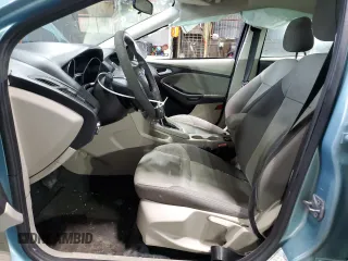 2012 Ford Focus SE with VIN 1FAHP3F27CL149328, listed as a Copart auction lot 56000325 with 147,097 mi miles and Salvage Title. Bid and sale history available at DreamBid. Image 7.