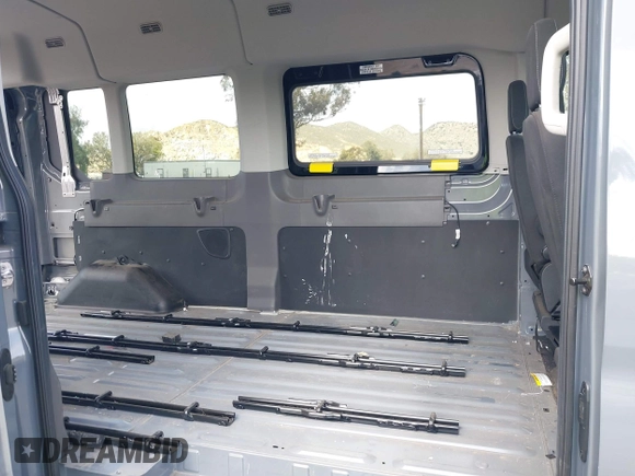 2023 Ford Transit Passenger XL with VIN 1FBAX2C82PKB58582, listed as a IAAI auction lot 41898895 with 16,416 mi miles and . Bid and sale history available at DreamBid. Image 8.