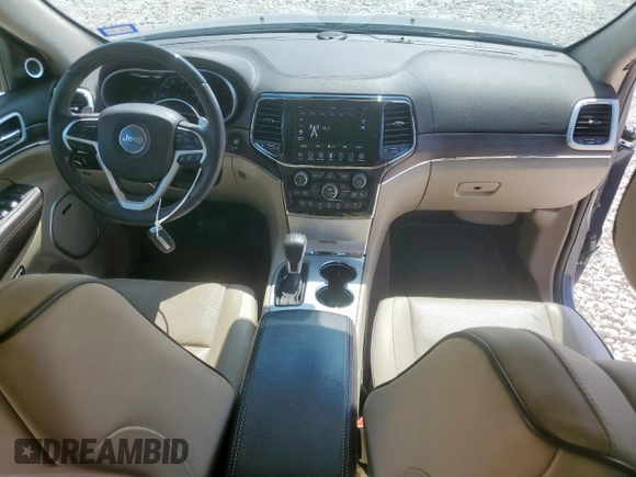 2021 Jeep Grand Cherokee Summit with VIN 1C4RJEJG2MC657402, listed as a Copart auction lot 59098465 with 61,442 mi miles and Salvage title. Bid and sale history available at DreamBid. Image 8.