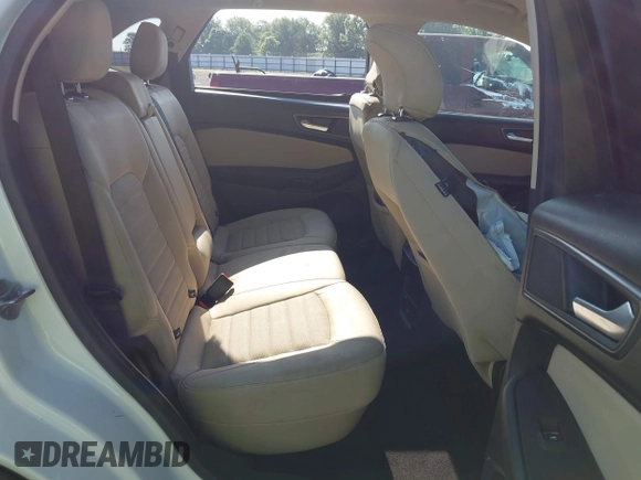 2015 Ford Edge SE z VIN 2FMTK3G92FBC22197, wystawiony jako IAAI lot #42578472 z przebiegiem 100 878 mil mil oraz . Historia ofert i sprzedaży dostępna na DreamBid. Obrazek 8.
