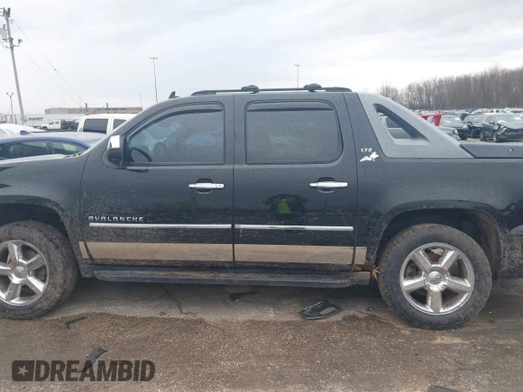 2011 Chevrolet Avalanche LTZ with VIN 3GNTKGE33BG111277, listed as a IAAI auction lot 42123375 with 209,024 mi miles. Bid and sale history available at carsss.com. Image 14.