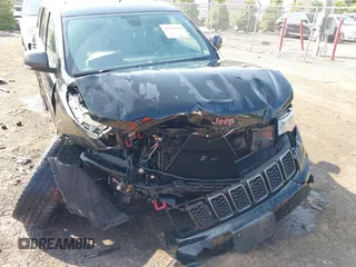 2018 Jeep Grand Cherokee Trailhawk with VIN 1C4RJFLG4JC241057, listed as a IAAI auction lot 42416590 with 81,822 mi miles and . Bid and sale history available at DreamBid. Image 6.