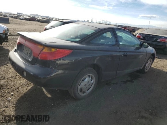 2002 Saturn SC z VIN 1G8ZY14702Z107166, wystawiony jako Copart lot #87435474 z przebiegiem 178 319 mil mil oraz Szkody całkowita. Historia ofert i sprzedaży dostępna na DreamBid. Obrazek 3.