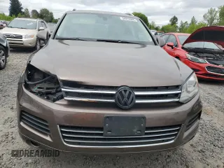 2012 Volkswagen Touareg Lux с VIN WVGEK9BPXCD012003, выставлен на аукционе Copart как лот 54910865 с пробегом 106 465 миль миль и Списание • Salvage title. История ставок и продаж доступна на DreamBid. Изображение 5.