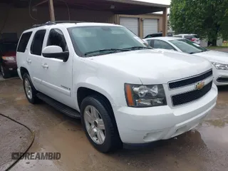 2007 Chevrolet Tahoe LT z VIN 1GNFC13J37R113756, wystawiony jako IAAI lot #42021634 z przebiegiem 247 631 mil mil oraz . Historia ofert i sprzedaży dostępna na DreamBid. Obrazek 1.
