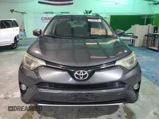 2016 Toyota RAV4 XLE with VIN 2T3RFREV3GW423028, listed as a Copart auction lot 63466735 with 164,207 mi miles and Salvage title. Bid and sale history available at DreamBid. Image 5.