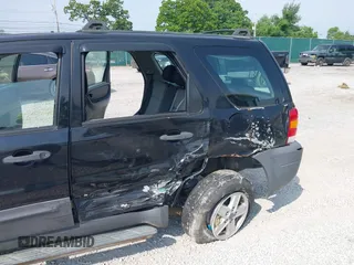 2007 Ford Escape XLS with VIN 1FMYU02ZX7KB90581, listed as a IAAI auction lot 42430544 with 164,595 mi miles and . Bid and sale history available at DreamBid. Image 6.