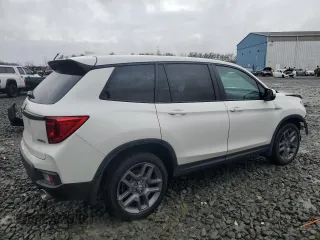 2023 Honda Passport EX-L z VIN 5FNYF8H59PB041173, wystawiony jako Copart lot #48941105 z przebiegiem 24 973 mil mil oraz Szkody całkowita. Historia ofert i sprzedaży dostępna na DreamBid. Obrazek 3.