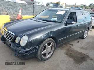 2001 Mercedes-Benz E-Class with VIN WDBJH65JX1B290284, listed as a IAAI auction lot 41713265 with 1 mi miles. Bid and sale history available at carsss.com. Image 2.