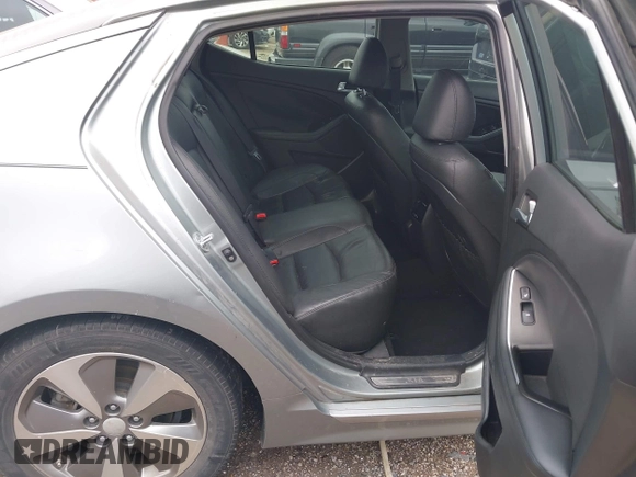 2015 Kia Optima EX with VIN KNAGN4AD9F5091318, listed as a IAAI auction lot 42181251 with 126,234 mi miles and . Bid and sale history available at DreamBid. Image 8.