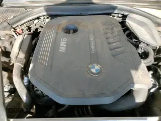 2017 BMW 7 Series 740i with VIN WBA7E2C57HG740275, listed as a Copart auction lot 68719665 with 114,599 mi miles and Salvage title. Bid and sale history available at DreamBid. Image 13.