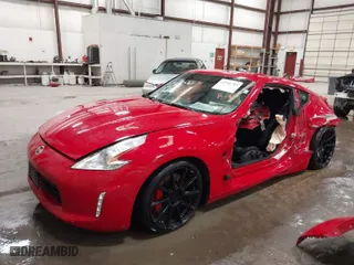 2014 Nissan 370Z with VIN JN1AZ4EHXEM633723, listed as a IAAI auction lot 41588284 with 1 mi miles. Bid and sale history available at carsss.com. Image 2.