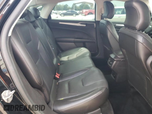 2016 Ford Fusion Titanium Hybrid with VIN 3FA6P0RUXGR204106, listed as a Copart auction lot 62769015 with 106,826 mi miles and Salvage title. Bid and sale history available at DreamBid. Image 10.