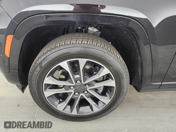 2021 Jeep Grand Cherokee Overland with VIN 1C4RJKDG7M8182214, listed as a IAAI auction lot 42796118 with 69,689 mi miles and . Bid and sale history available at DreamBid. Image 12.