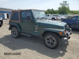 1999 Jeep Wrangler Sahara z VIN 1J4FY49S0XP453920, wystawiony jako Copart lot #61808475 z przebiegiem 129 062 mil mil oraz Czysty tytuł • Clean title. Historia ofert i sprzedaży dostępna na DreamBid. Obrazek 4.