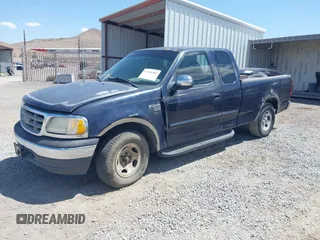 2001 Ford F-150 XL with VIN 1FTRX17L41NA08695, listed as a IAAI auction lot 42558909 with 267,203 mi miles and . Bid and sale history available at DreamBid. Image 2.