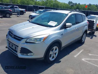 2013 Ford Escape SE with VIN 1FMCU0GX0DUA19811, listed as a IAAI auction lot 42009015 with 135,662 mi miles. Bid and sale history available at carsss.com. Image 17.