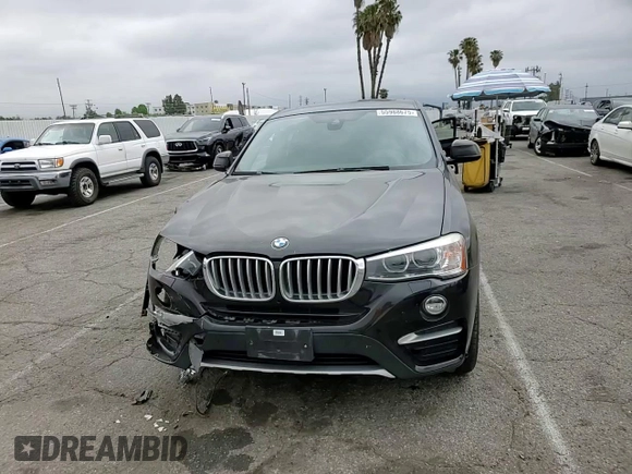 2018 BMW X4 xDrive28i with VIN 5UXXW3C57J0T82047, listed as a Copart auction lot 55988675 with 103,692 mi miles and Salvage title. Bid and sale history available at DreamBid. Image 14.
