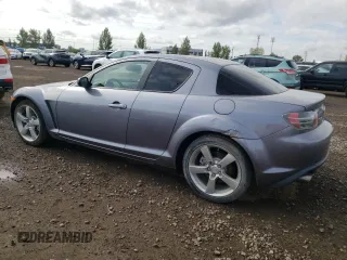2005 Mazda RX-8 with VIN JM1FE173050145886, listed as a Copart auction lot 71110404 with 66,894 mi miles and Salvage Title. Bid and sale history available at carsss.com. Image 2.