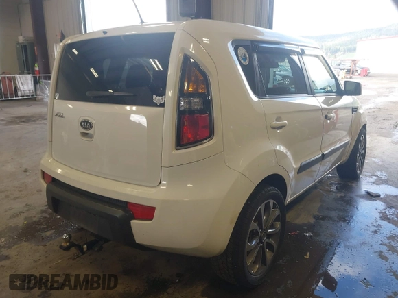 2011 Kia Soul + with VIN KNDJT2A24B7716580, listed as a IAAI auction lot 41974058 with 139,940 mi miles. Bid and sale history available at carsss.com. Image 4.
