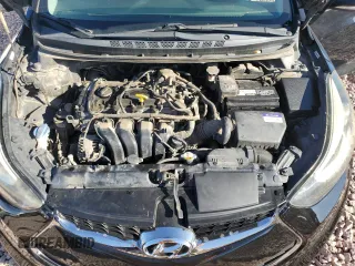 2014 Hyundai Elantra Coupe with VIN KMHDH6AH2EU029402, listed as a Copart auction lot 73036614 with 106,749 mi miles and Salvage Title. Bid and sale history available at carsss.com. Image 11.