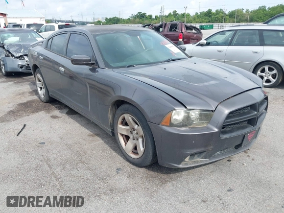 2014 Dodge Charger Police z VIN 2C3CDXAT9EH191184, wystawiony jako IAAI lot #42468882 z przebiegiem 202 790 mil mil oraz . Historia ofert i sprzedaży dostępna na DreamBid. Obrazek 1.