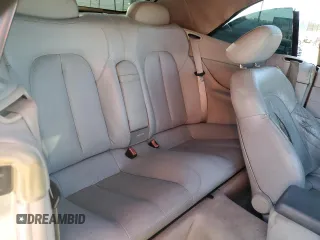 1999 Mercedes-Benz CLK 320/430 z VIN WDBLK65G2XT024808, wystawiony jako Copart lot #85336294 z przebiegiem 289 898 mil mil oraz Szkoda całkowita • Salvage title. Historia ofert i sprzedaży dostępna na DreamBid. Obrazek 11.