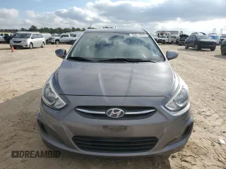2015 Hyundai Accent GLS with VIN KMHCT4AEXFU906644, listed as a Copart auction lot 43817915 with 121,072 mi miles and Salvage Title. Bid and sale history available at carsss.com. Image 5.