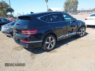 2021 Genesis GV80 with VIN KMUHB4SB7MU034287, listed as a IAAI auction lot 41663039 with 65,405 mi miles and . Bid and sale history available at DreamBid. Image 4.