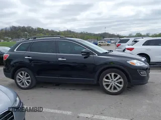 2011 Mazda CX-9 Grand Touring z VIN JM3TB2DAXB0300466, wystawiony jako IAAI lot #41921411 z przebiegiem 196 257 mil mil oraz . Historia ofert i sprzedaży dostępna na DreamBid. Obrazek 13.