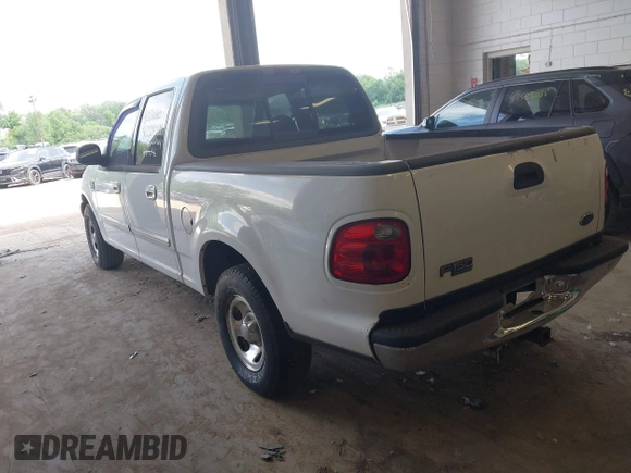 2001 Ford F-150 XLT with VIN 1FTRW07LX1KD77186, listed as a IAAI auction lot 42564774 with 190,647 mi miles and . Bid and sale history available at DreamBid. Image 3.