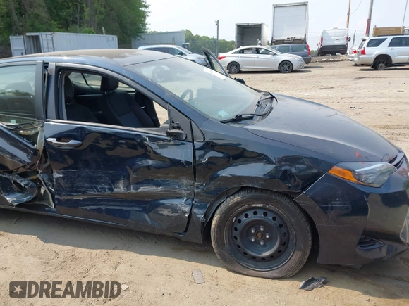 2018 Toyota Corolla L with VIN 2T1BURHE1JC052651, listed as a IAAI auction lot 42430958 with 104,664 mi miles and . Bid and sale history available at DreamBid. Image 6.